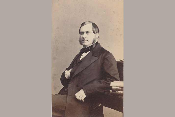 Louis De Geer d.ä. sitter vid ett skrivbord.