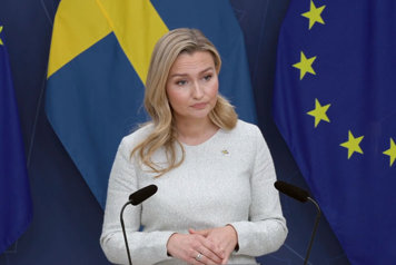 Statsrådet stå bakom en talarstol